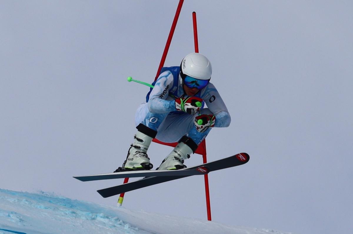 Ski Race Academy Mals athlete airborne on a Watles race course
