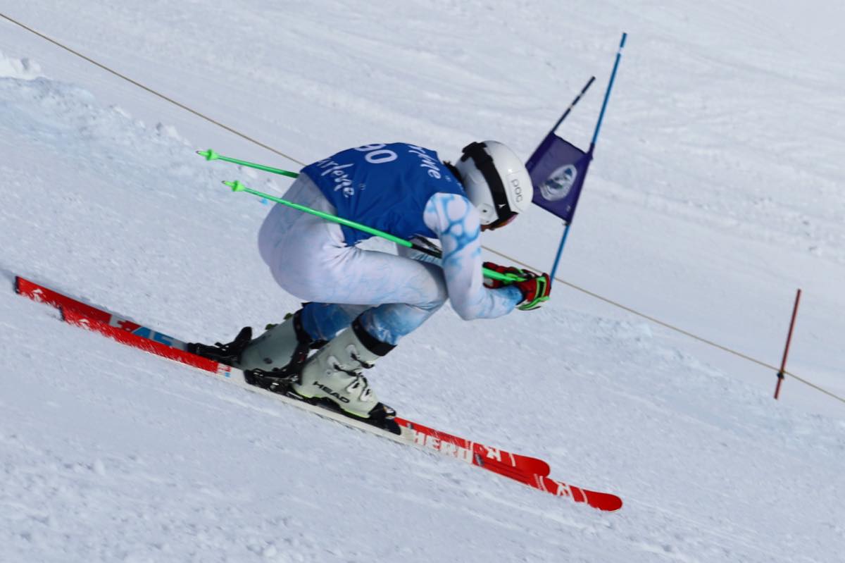 Ski Race Academy Mals athlete in a racing tuck at Watles